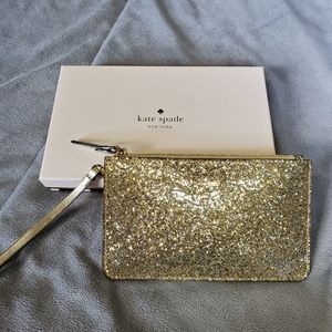 KATE SPADE NEW YORK Gold glitter wristlet